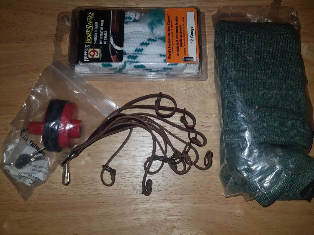 Gun sock,trigger lock,bore snake,game carrier