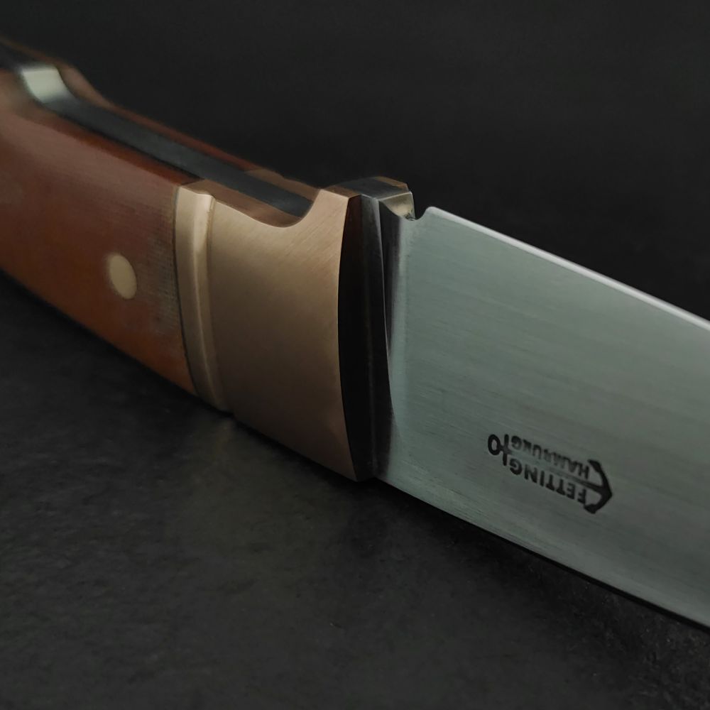 m390_micarta_bronze-2.jpg.a5114e74fc17f4d830f13b2d64baf718.jpg